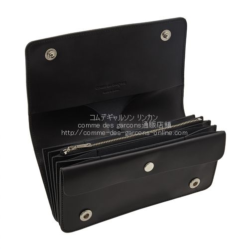 Comme des garcons 2025 live free wallet