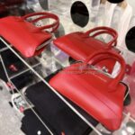 コムデギャルソン ハンドル付きがま口財布 クラスプハンドルズ