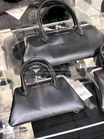 コムデギャルソン ハンドル付きがま口財布 クラスプハンドルズ