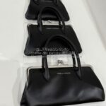 コムデギャルソン ハンドル付きがま口財布 クラスプハンドルズ