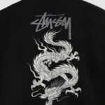 アイ ジュンヤ ワタナベ マン× Stussy Dragon プリント スタジャン-スタジアムジャンパー